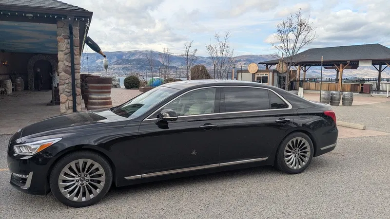 Black luxury sedan at an Okanagan winery